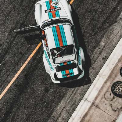 A porsche on the side of the road